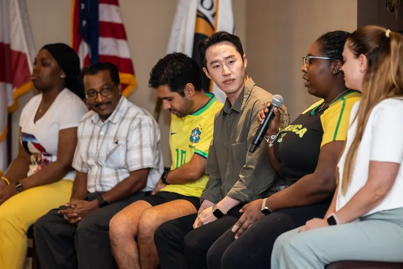 Rosen College students on a panel at International Day