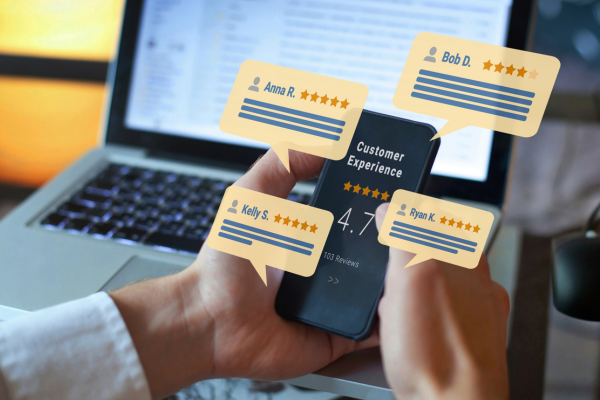 Person holding a smartphone showing a 4.7 customer experience rating, with a laptop in the background. Speech bubbles with reviews overlay the image.